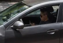 What is the fine for using a cell phone while driving in Jalisco?