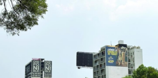 Mexico City plastered with illegal advertising; chaos in the urban landscape