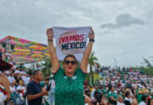 Fans crowd the boardwalk and streets of Cancun