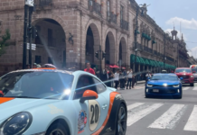 Sports cars displayed in Morelia’s Historic Center before the route to Ixtapa.