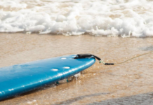 How did she get there? A girl stranded on a surfboard is rescued off the coast of Baja California Sur.