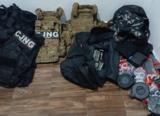 2 alleged CJNG members arrested at safe house in Colima; Navy seizes arsenal and finds human remains.