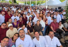 Politicians hog the front rows before the president in Cancún; the people are relegated to the back.